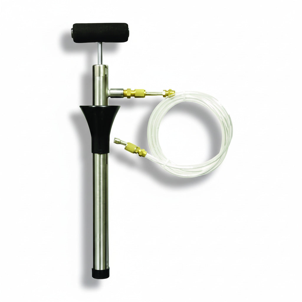 Bomba manual de carga de aceite Nu-Calgon modelo 4814-40 para sistemas de refrigeración y aire acondicionado.