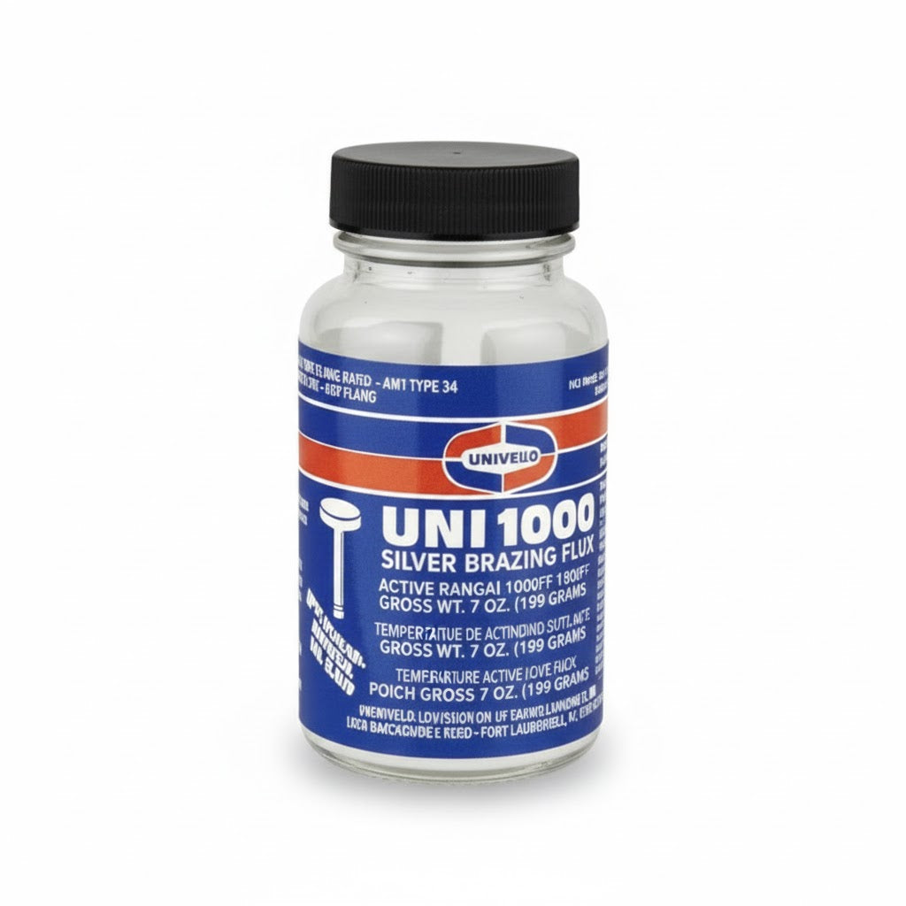 Frasco de fundente en pasta Uniweld UNI1000 para procesos de soldadura fuerte de plata en sistemas de refrigeración.